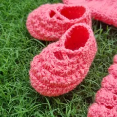 Look at these tiny, handmade baby booties. I pay close attention to detail to make sure every piece is perfect and safe for a baby.
