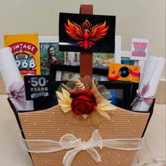 This is what a truly personal gift looks like. For a 50th birthday, I created a themed hamper celebrating a client's love for Kathak dance and cricket, complete with custom posters, photo frames, and other curated items that tell her unique story.