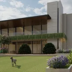 My work often starts from the outside in. I design homes, not just interiors, focusing on how the building interacts with its environment. This modern residence uses clean lines, large glass panels, and natural materials to create a seamless connection between the indoor and outdoor spaces.