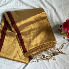 Our 'Aarini' tissue cotton saree in a beautiful gold with a maroon border. The saree comes with a running blouse, but we love styling our sarees with contrast blouses for a different look.