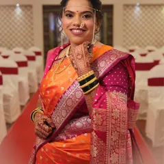 That happy smile says it all. I created this classic Maharashtrian bridal look with an emphasis on glowing skin and defined eyes, perfect for her wedding day.