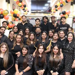 This is my amazing team. Every stylist and staff member here is part of the family, and we all share the same passion for making our clients feel their absolute best.