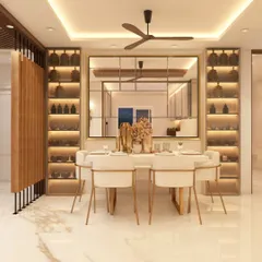 This formal dining space is designed for sophisticated entertaining, featuring illuminated display cabinets and a large, reflective mirror to enhance the sense of space. The wooden slat partition provides a subtle separation from the living area while maintaining an open, connected feel.