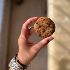 This is our Oozy Chocolate Chunk Cookie. It's made with 50% wholewheat and oat flour and packed with 55% dark chocolate chunks.
