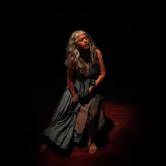 A portrait of desperation from our production of "Medea." The lighting design plays a crucial role in setting the mood and highlighting the emotional turmoil of the characters.