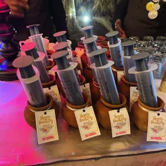 A key part of our 'Bar Doctor' theme is our unique serving style. Here, shots are served in syringes, which guests can dispense into their drinks or take directly for a fun, interactive experience.