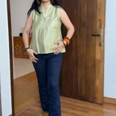 This light green sleeveless top was created from an old dress that I no longer wore. It's a simple way to get a brand new top for your jeans.