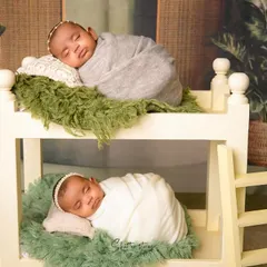 Double the joy, double the cuteness! I specialize in newborn twin photography, ensuring both babies are posed safely and beautifully, like these two sleeping soundly in their own little bunk beds.