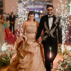 A grand reception entrance complete with sparklers and smiles. We capture the glamour and excitement as you make your first appearance as a married couple.