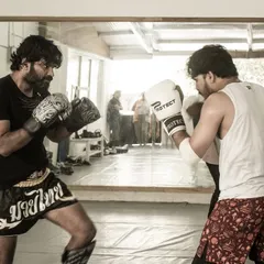 A moment of intense focus during a sparring session. This is where you put your training to the test, learning about distance, timing, and defense in a controlled environment.