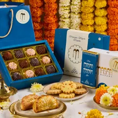 Our complete Ganpati gifting collection, featuring boxes of Modak Bonbons, our signature Modak Chocolate Bar, and savory Mathri Shortbreads. It's everything you need for the festive season, packed and ready to gift.