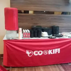 A complete self-service station with a water cooler, glasses, and all necessary disposables, ensuring your guests have everything they need.