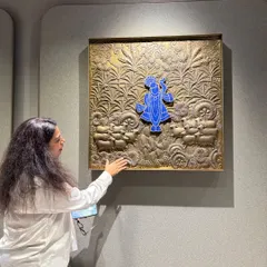 Art can be a powerful form of spiritual expression. This intricate brass wall art, featuring a depiction of Shrinathji, was chosen to bring a sense of divinity and tradition into a modern home.