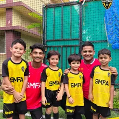 Coaches with some of our youngest players. Our grassroots coaching is all about positive reinforcement and creating a love for the sport.