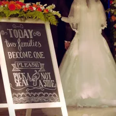 A throwback to one of our early events, where a simple chalkboard sign captured the spirit of the day. This image is a reminder of our journey and our long-held belief that every detail matters.