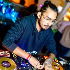 Here I am at a Wednesday night event, focused on delivering a seamless mix of Bollywood and commercial hits.