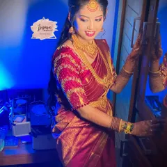 Another view of this beautiful reception style. The hairstyle is a soft, wavy look that adds a touch of modern elegance, paired with flawless makeup.