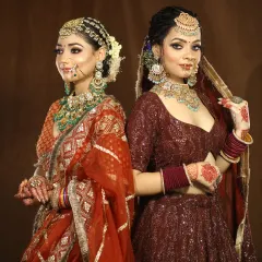 Two brides, two different looks, both stunning. This photo shows the versatility in my work, creating unique styles for each individual client.