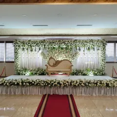 A full view of the elegant white floral backdrop.