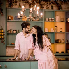 A sweet and romantic moment in our colorful kitchen set, perfect for a modern and fun pre-wedding shoot.