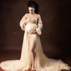 Every mother-to-be is a goddess creating life. This portrait uses golden fabrics and soft, ethereal lighting to capture that divine feminine energy in a timeless maternity photo.