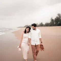 A quiet walk along the beach, hand in hand, with shoes off and hearts open. This is the essence of a romantic pre-wedding shoot, capturing the simple, profound connection between two people.