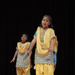 Another shot of our young performers on stage. We focus on teaching them not just dance steps, but also stage presence and how to express themselves.