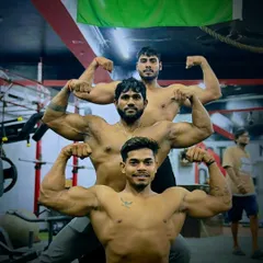 Yaari (friendship) in the gym. Posing with my clients who have become like brothers. We are all on this journey together.