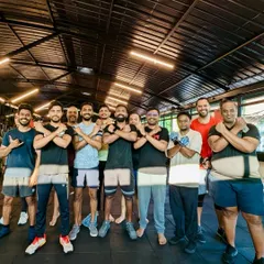 Our crew showing their strength and unity. We're a team that pushes each other to be better every single day.
