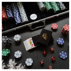 A closer look at the personalized poker chips and cards. Each element is customized with the client's initials, adding a layer of sophistication and personal touch to every game night.