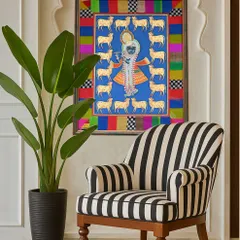 Here is a finished Pichwai painting, beautifully settled in its new home in Singapore. I created a custom fabric border using colorful studio offcuts, carefully pieced together to echo the vibrant palette of the artwork without overpowering it. It shows how a thoughtful frame can elevate a piece of art into a personal statement.