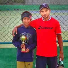 We are incredibly proud of our players' success. Here I am with our student Likith S Gowda after he secured a runner-up position in the U-12 AITA Champion Series tournament.
