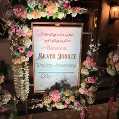 Arriving for a Silver Jubilee wedding anniversary celebration. 25 years of love is a huge milestone, and it deserves a party to match.