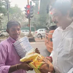 The smile on his face after receiving the bag of flour is a reminder that true wealth lies in helping others.