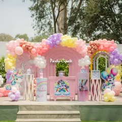 A wide shot of the unicorn party setup for Kashni's 8th birthday. We included hot air balloon props and a large balloon '8' to mark the special occasion.
