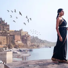 Banaras isn't just a location; it's a feeling. Here, against the ancient ghats, a moment of stillness is captured, embodying the timeless spirit and soulful connection of my 'Rabt Banaras' series.