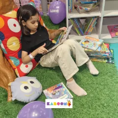 A quiet moment with a good book. We offer a space for both active and calm play.