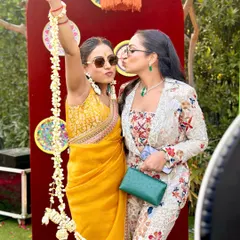 Pouts, kisses, and pure fun at a Haldi celebration. We love capturing these candid moments of friendship and joy that make weddings so special.