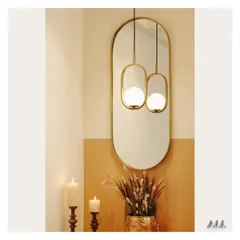 The reflection in the mirror doubles the impact of the stylish pendant light. This is a simple technique we use to enhance brightness and add depth to smaller spaces like foyers.