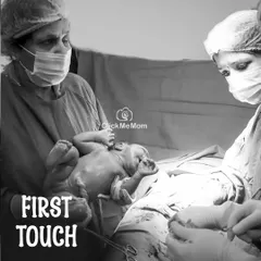 The first touch. This powerful black and white image from a hospital session captures the incredible moment a mother meets her baby for the very first time.