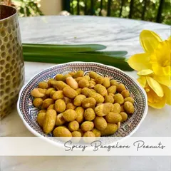 My Spicy Bangalore Peanuts are a local favorite. I coat fresh peanuts in a blend of red and green chillies, turmeric, and hing, then roast them for a perfectly spicy and crunchy bite.