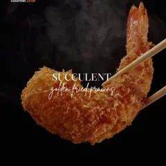 For seafood lovers, my succulent golden fried prawns are a must-try. They are perfectly crispy on the outside and juicy on the inside, making for an indulgent bite.