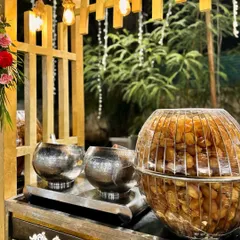 My Pani Puri counter is designed for elegance and ease. Guests can enjoy their favorite street food from our beautiful setup, complete with large bowls of spicy and sweet water and a mountain of crispy puris.