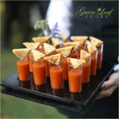 A comforting and creative starter. I serve rich, warm tomato soup in shot glasses, garnished with a miniature grilled cheese sandwich for a playful twist on a classic pairing.