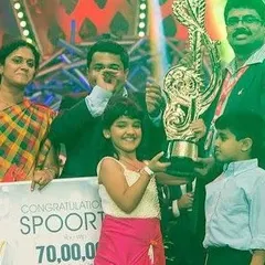 The winning moment of Super Singer Junior 4. This picture captures the culmination of a year of hard work and the incredible support from my family, the audience, and the entire team at Vijay Television.