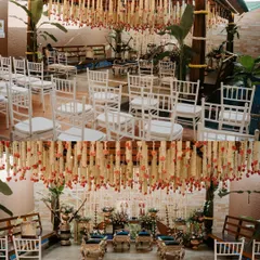 A look inside a traditional Thotti Mane (courtyard house) wedding we designed. This video shows how we use hanging floral decor and elegant silver and blue seating to transform the space while respecting its traditional architecture.