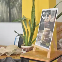 A little corner of our studio. We try to make it a warm and welcoming space for everyone.