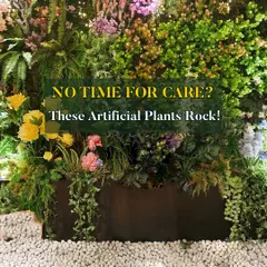 No time for care? These artificial plants rock. This image showcases a dense and varied planter box filled with our premium artificial flowers and foliage, providing all the beauty of a garden with none of the work.