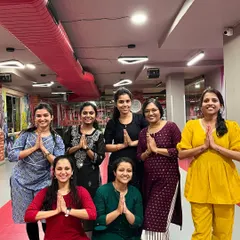 A group of ladies in traditional wear for a special Ganesh Chaturthi class. I organize themed sessions for family-oriented festivals, making them a great activity for mothers and daughters.
