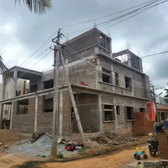 A new project beginning to rise. This photo captures the early stages of construction, with the ground floor structure and columns in place, ready for the next level.